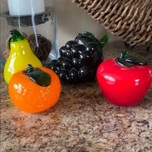 Glass fruit. Grapes have chip in the leaf.